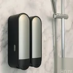 Dispenser doble para shampoo y acondicionador color negro DA para hoteles y alquileres diarios.